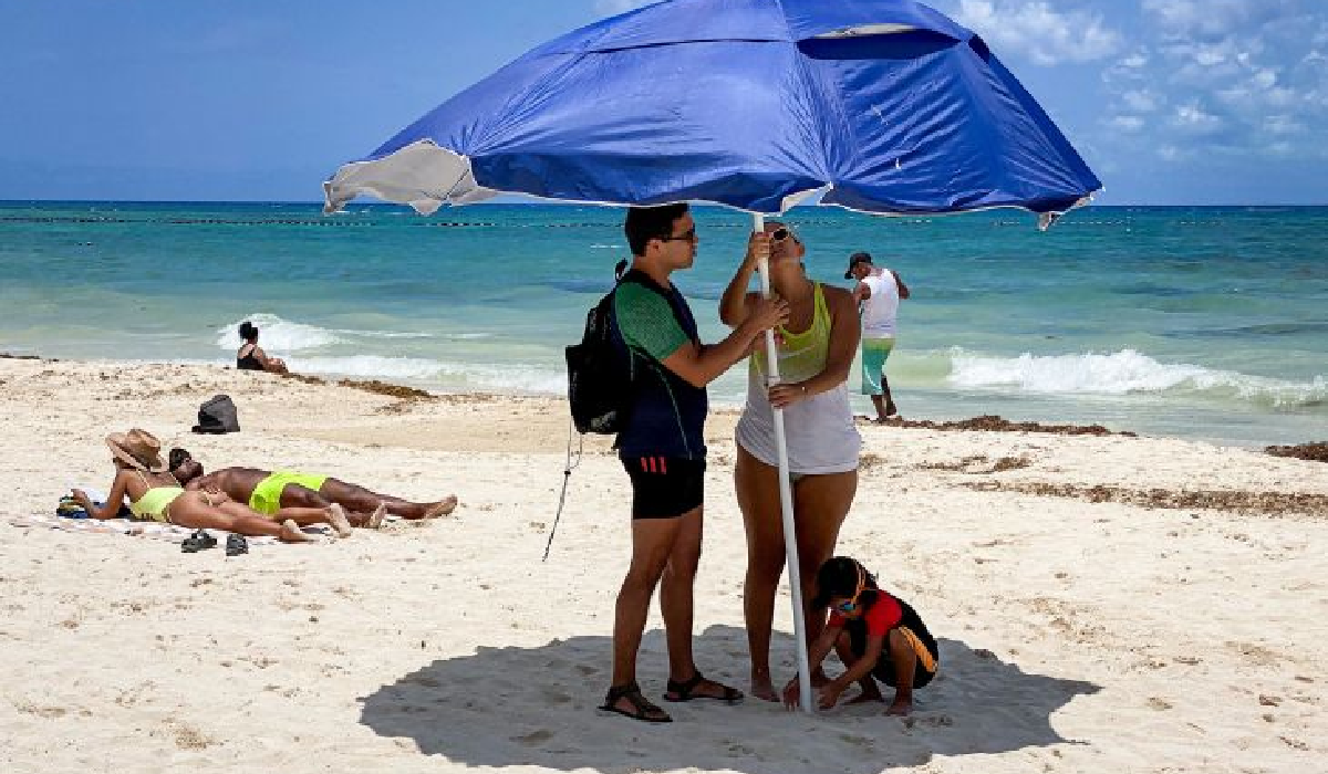 Personas en la playa