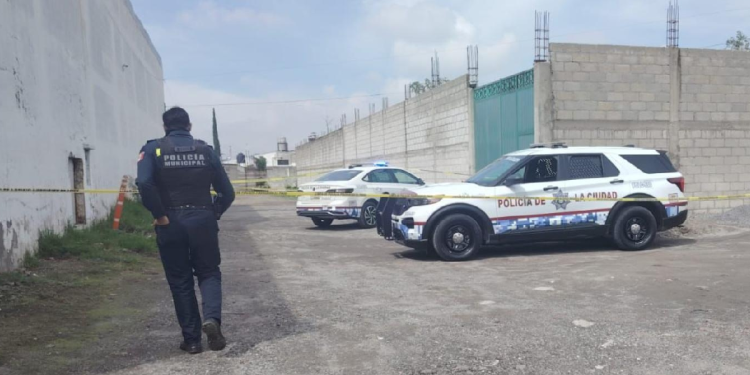 Hallan cuerpo en mercado Morelos Puebla