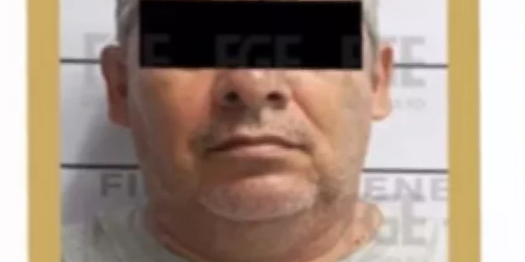 Rostro de Juan Carlos “N” al momento de su detención en Playa del Carmen