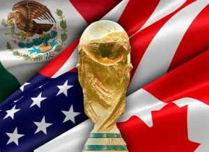 Trofeo de la Copa del Mundo frente a las banderas de México, Estados Unidos y Canadá, países anfitriones del Mundial 2026.