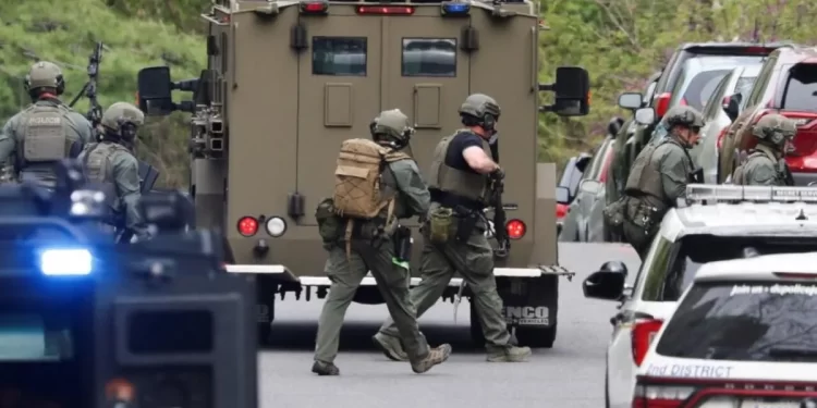 Washington identifica al tirador; dos guardias permanecen hospitalizados